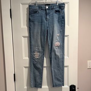 White House Black Market Light Blue Ripped Jeans with embroidered flower detail